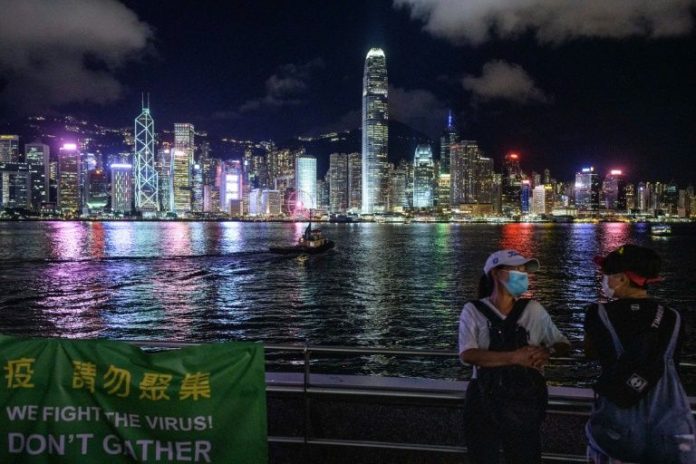 Hong Kong reimposes strict social distancing as fourth wave strikes