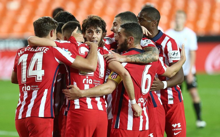Atletico extend win streak to move level with leaders Sociedad