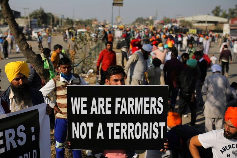 Ignoring protests, Modi refuses to budge on farm reforms