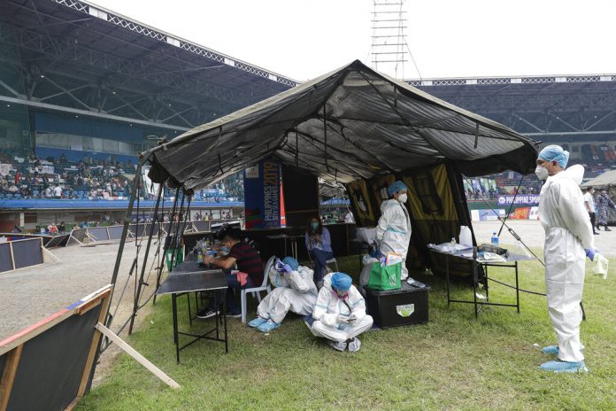 Philippine virus curbs extended in capital to end of the year