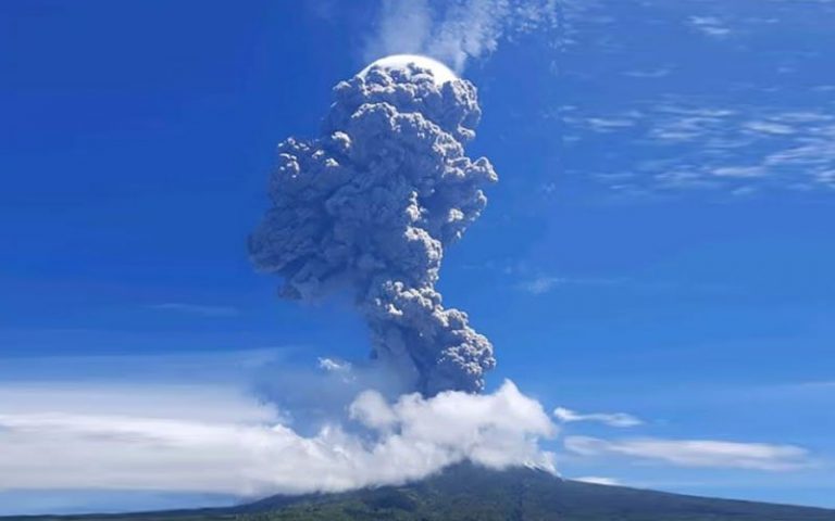 Indonesian volcano erupts, triggers flight warning