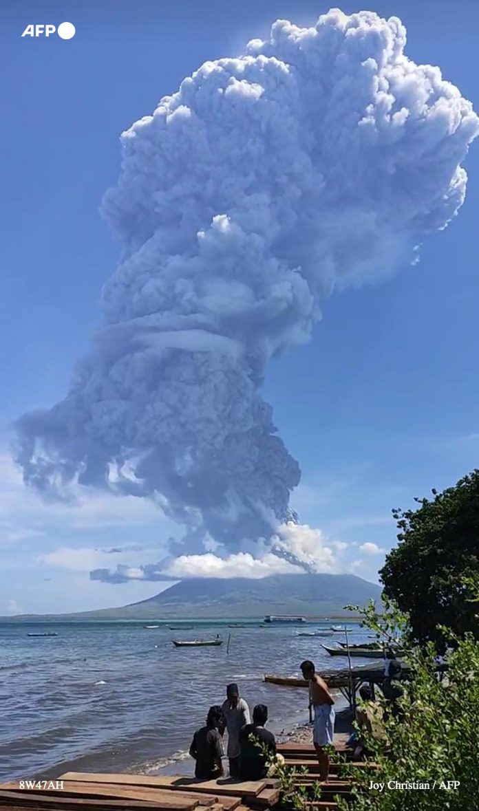Indonesian volcano belches huge tower of smoke and ash