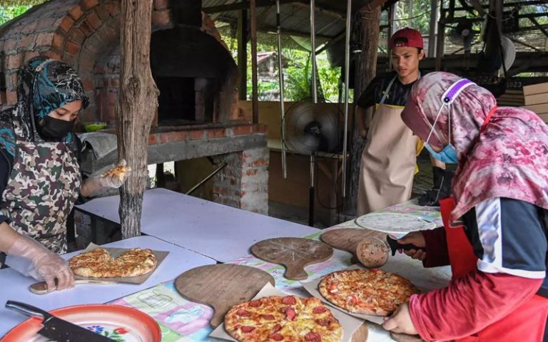 Malaysian family’s ‘pandemic pizza’ goes viral