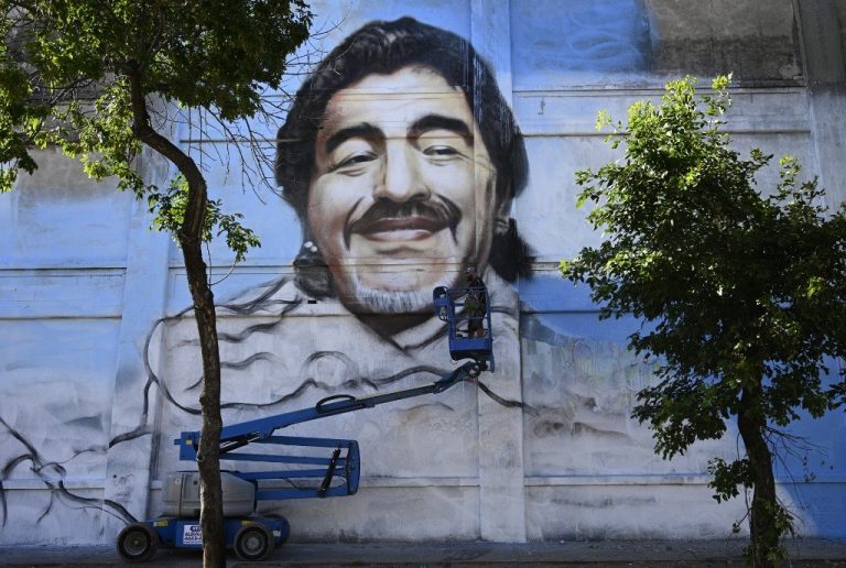 Street artist unveils mural to ‘Saint’ Diego Maradona