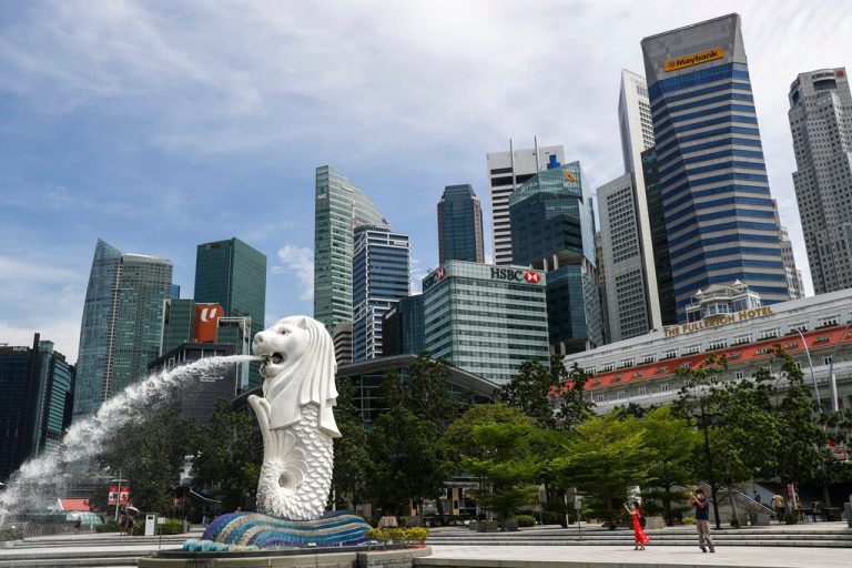 Britain inks free trade pact with Singapore