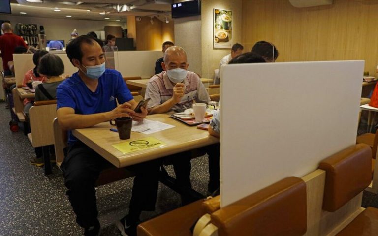 Hong Kong imposes new virus restrictions to battle fourth wave