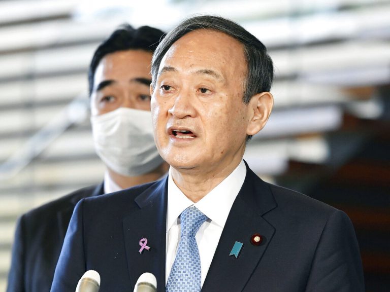 Japan’s Suga may halt travel campaign as support plummets over virus