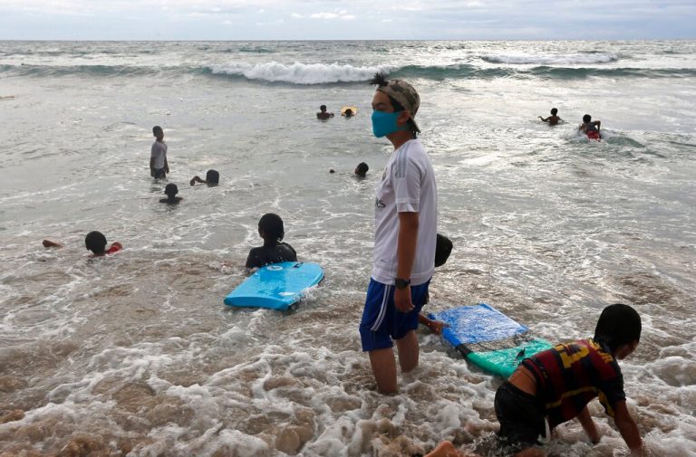 Indonesia shortens year-end holiday to contain virus outbreak