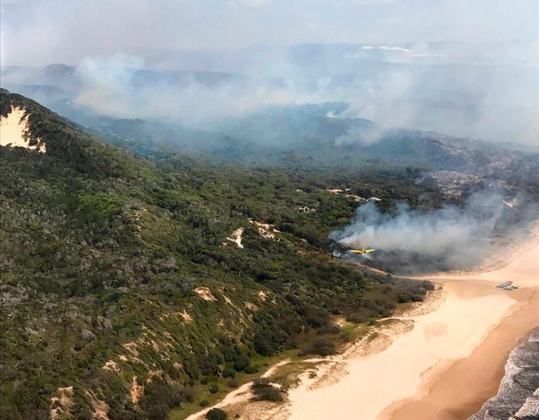 Rains dampen bushfire on Australia’s Fraser Island but danger not over