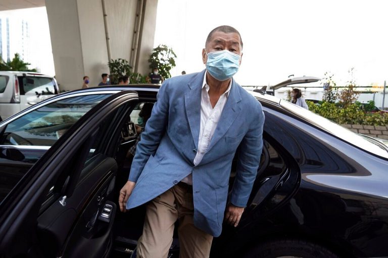 Hong Kong media tycoon charged as clampdown gathers pace
