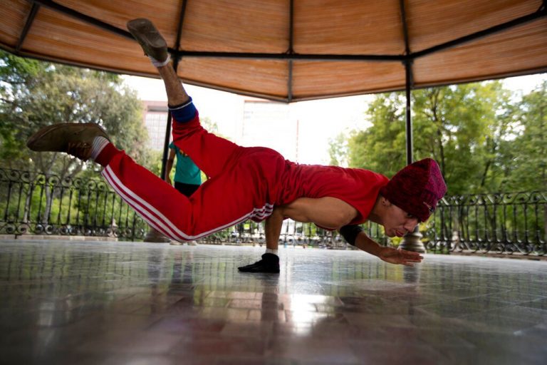 Surfing, breakdancing among 4 sports to win Paris 2024 spot