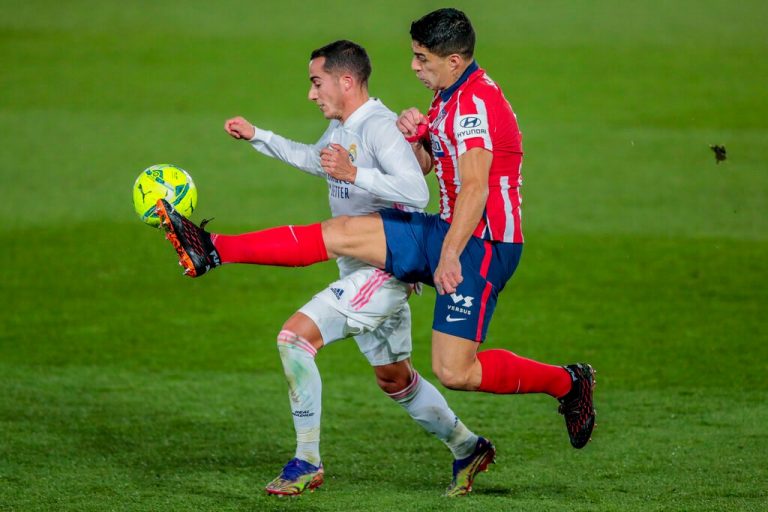 Suarez nets double as Atletico go clear at the top