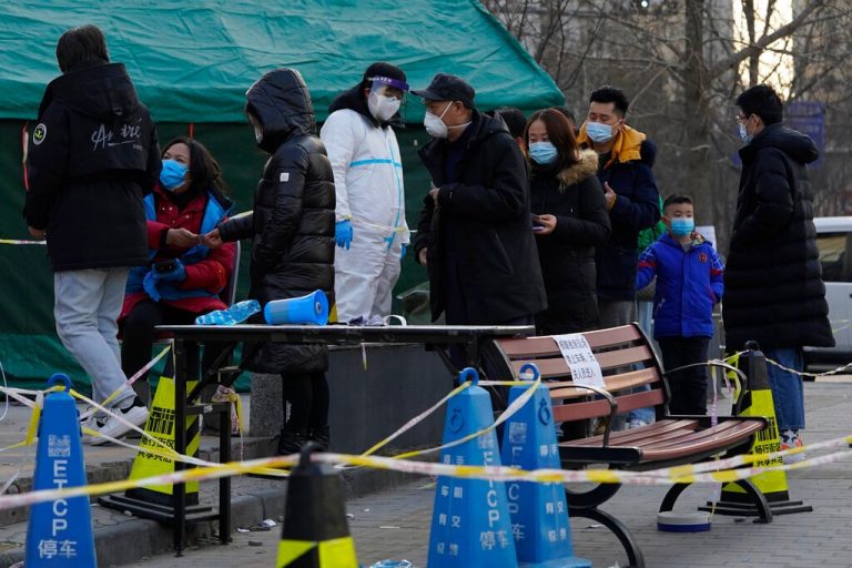 Beijing locks down for first time since June in Covid fight