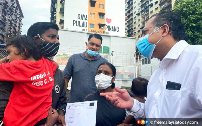 Penang govt gives car boot family temporary flat
