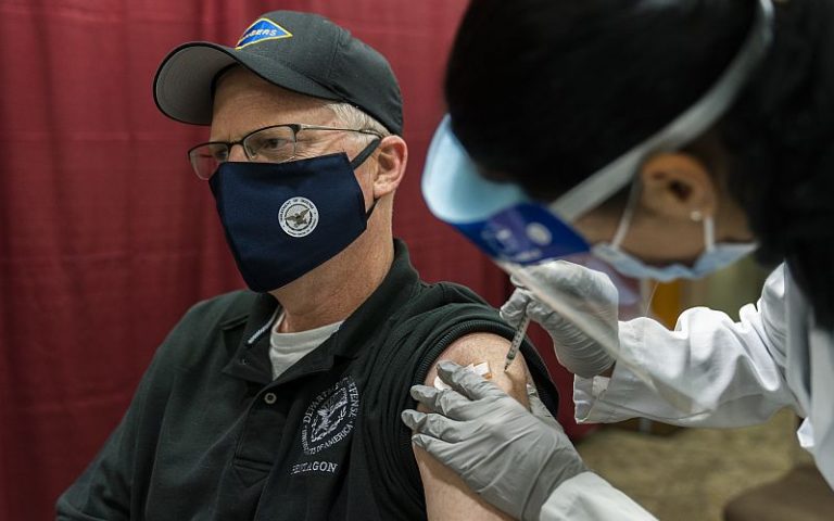 Pentagon chief among first Americans to receive Covid-19 vaccine