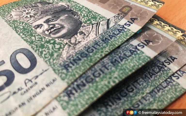 Ringgit falls against US dollar on lack of demand, lower Fitch downgrade