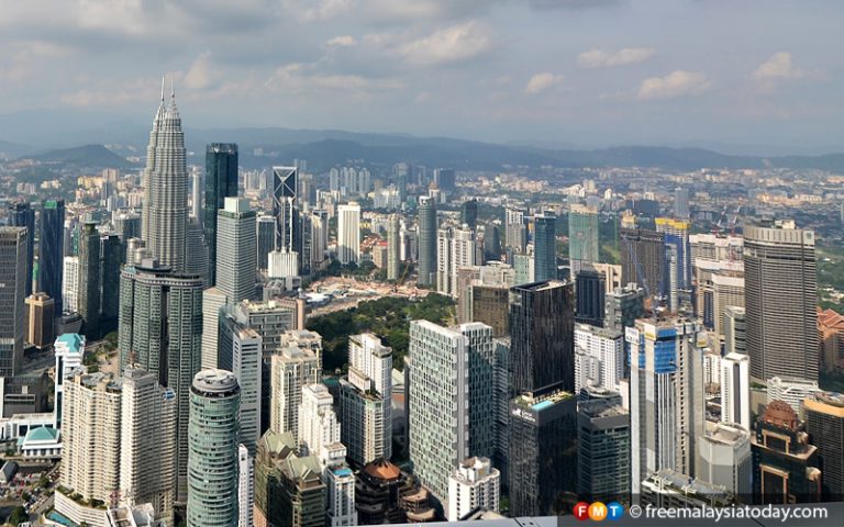Address issues raised in Fitch report, Kit Siang tells Tengku Zafrul