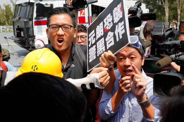 Ex-HK lawmaker Ted Hui says accounts frozen after he sought exile