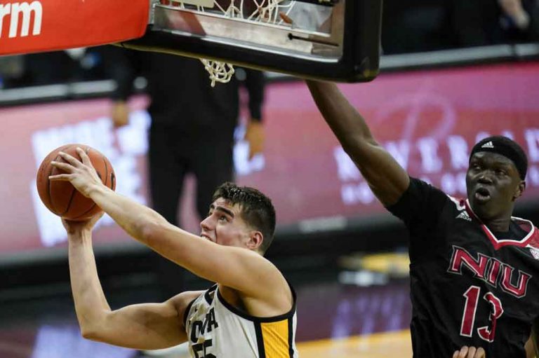Garza scores 23, No. 3 Iowa routs Northern Illinois