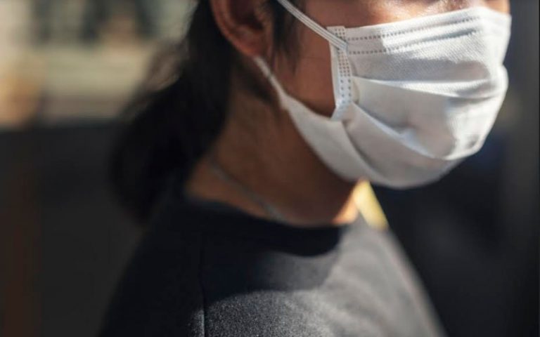 Face masks and PPEs modelled on Chinese runway