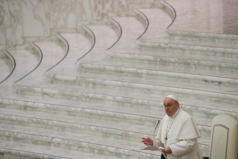 Pope spreads Christmas cheer, tells Vatican workers their jobs are safe