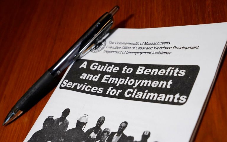 US jobless claims drop sharply but remain high