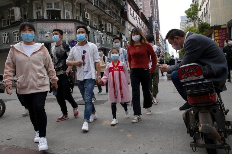 ‘I died too’: A year after outbreak, Wuhan kin struggle to move on