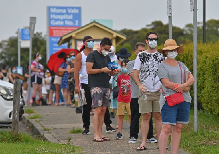 Australian virus cluster triggers travel clampdown