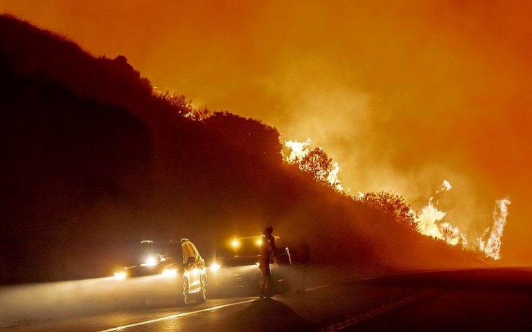 Unrestrained fire raging through US canyon sends residents fleeing