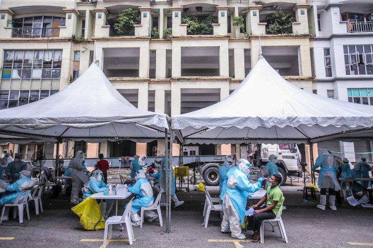 Covid-19 vaccine: Include foreign workers in high-risk group if warranted, says WHO