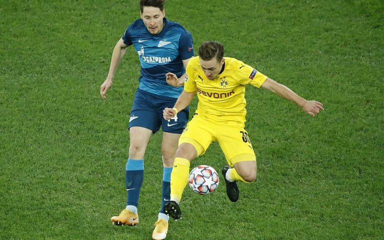 Dortmund clinch top spot with victory at Zenit