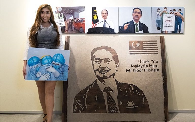 The art of giving: Ipoh artist paints for frontliners