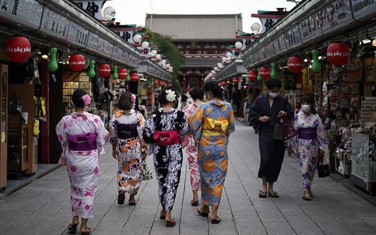 Japan urges ‘quiet’ year-end, but tourism campaign will go on