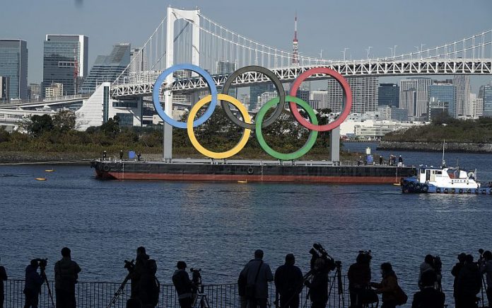 Giant Olympic rings return as Tokyo bids to build excitement