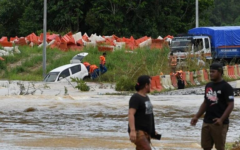 Man in floating Myvi saved by father and son