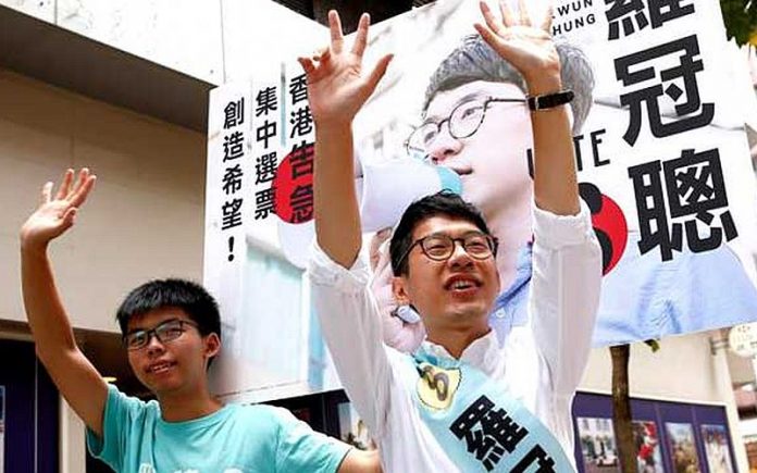 Exiled HK protest leader holds first meeting with UK govt