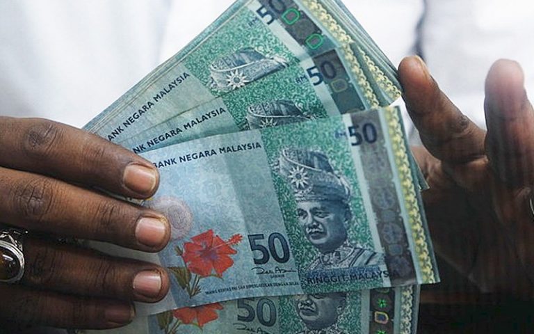 Ringgit opens slightly lower against US dollar