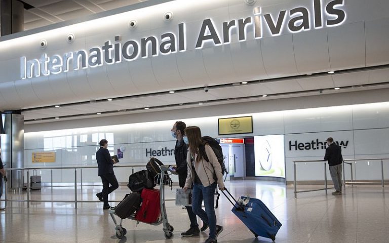 UK cuts Covid self-isolation period to 10 days from 14