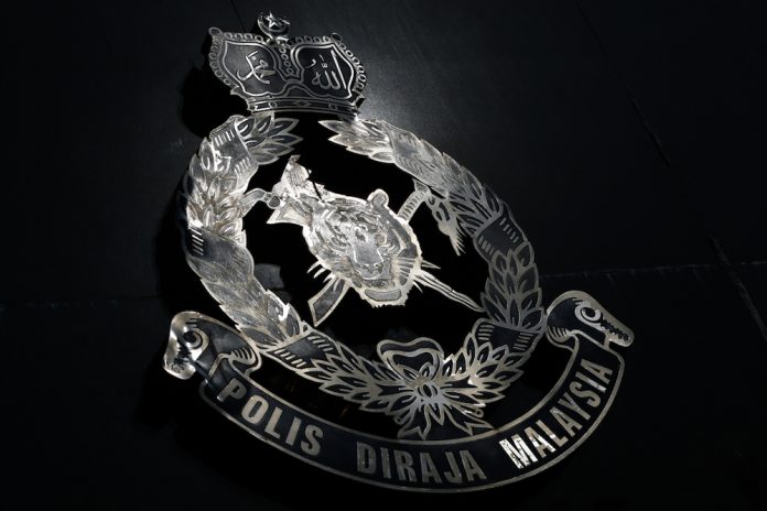 Gang impersonating police to commit robberies busted in Taiping