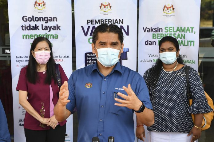 Edu minister gets Covid-19 vaccination, tells teachers to register for their shots too
