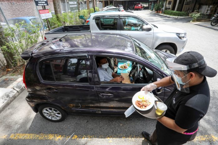 Eager to eat out, Malaysians get a taste for drive-in dining