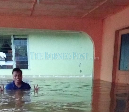 Heavy downpour causes floods in Samarahan, Serian, Lundu
