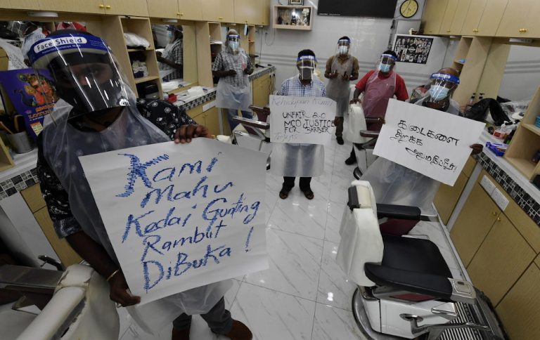 With revenue declining up to 50pc, barbershop operators plead for permission to operate during MCO