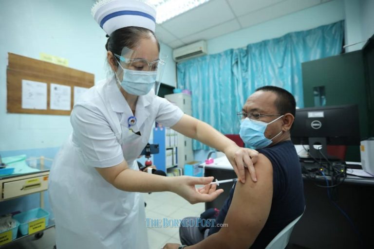 Three media practitioners among first 132 frontliners to receive Covid-19 immunisation jab