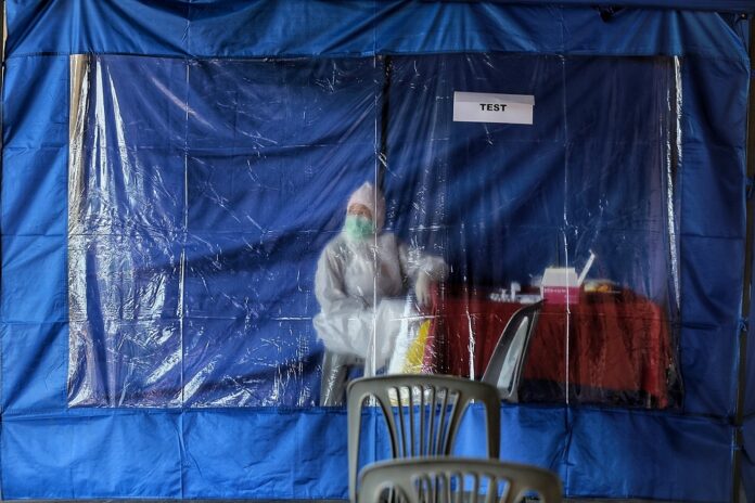 Hours before MCO ends, new Covid-19 cases go above 2,000 again