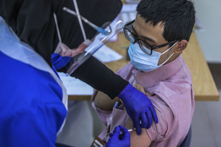 Health minister says 301,699 people have received first dose of Pfizer-Biontech vaccine as of March 14