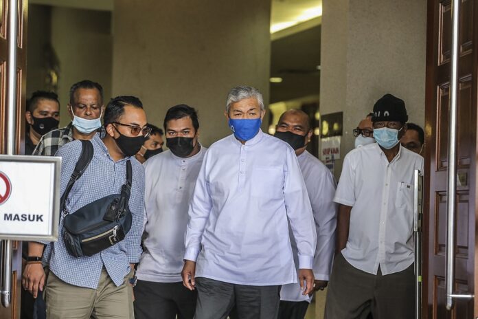 In Zahid’s trial, lawyer suggests political motivation behind 47 charges against Umno president after Pakatan became govt