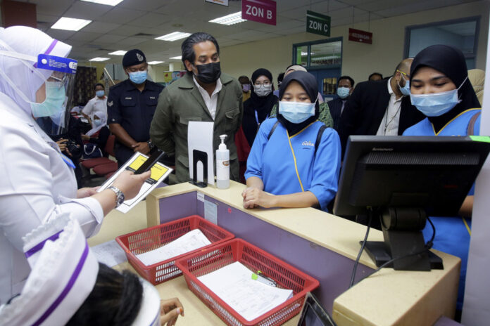 Malaysia returned 585 damaged vials of Covid-19 vaccine to Pfizer, says Khairy