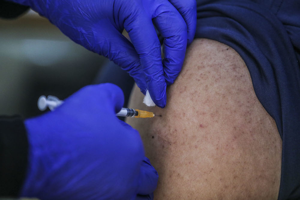 Minister: 104,363 Neighbourhood Watch Community members sign up for Covid-19 vaccination