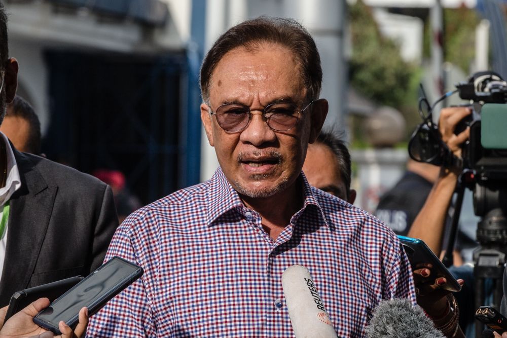 Anwar gives statement to police over leaked audio clip
